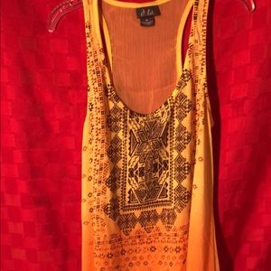 Aztec-like print tang top.